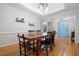 Dining room with hardwood floors, a large wood table, and decor at 3543 Pine Grove Dr, Douglasville, GA 30135