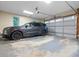 Attached garage with parking for car, storage and automatic door at 3543 Pine Grove Dr, Douglasville, GA 30135