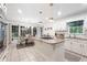 Bright eat-in kitchen with granite counters, stainless appliances, and a view of the landscaped backyard at 3543 Pine Grove Dr, Douglasville, GA 30135