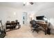 Bright office space with computer and desk setup plus guitar display and neutral tones at 3543 Pine Grove Dr, Douglasville, GA 30135