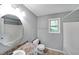 Full bathroom features a single sink vanity, and a shower and tub combo at 36 Laurel Ne Way, White, GA 30184