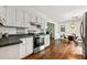 Functional kitchen featuring stainless steel appliances, bright lighting, and an open layout at 385 Russell Ridge Dr, Lawrenceville, GA 30043