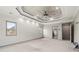 Large bedroom with trey ceiling, exterior views, and ensuite access at 4015 Roberts Crest Ln, Suwanee, GA 30024