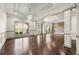 Bright dining room featuring hardwood floors, recessed lighting, large windows and decorative ceiling at 4015 Roberts Crest Ln, Suwanee, GA 30024