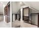 Spacious walk-in closet provides ample storage with custom shelving and mirrored wall creating depth at 4015 Roberts Crest Ln, Suwanee, GA 30024