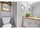 Charming half bath with decorative mirrors and a granite-topped vanity at 4506 Westcliff Ne Trce, Roswell, GA 30075