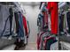 Walk-in closet features organized clothing racks and shelving for storage at 4506 Westcliff Ne Trce, Roswell, GA 30075
