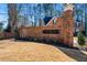 Community entrance featuring brick signage and manicured landscaping for a welcoming atmosphere at 4506 Westcliff Ne Trce, Roswell, GA 30075
