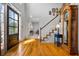 Bright and spacious entryway with hardwood floors and a grand staircase at 4506 Westcliff Ne Trce, Roswell, GA 30075