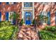 Close-up of the front door and steps of a beautiful home with manicured shrubbery at 4506 Westcliff Ne Trce, Roswell, GA 30075