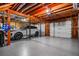 Spacious garage with epoxy floors and a white SUV at 4506 Westcliff Ne Trce, Roswell, GA 30075