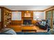 Inviting Gathering room featuring wood trim, and a brick fireplace at 4506 Westcliff Ne Trce, Roswell, GA 30075