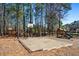 Community playground featuring play structures, a basketball court, and ample space for activities at 4506 Westcliff Ne Trce, Roswell, GA 30075