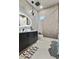 Modern bathroom featuring a unique mirror, stylish vanity, and eye-catching decor at 112 Rogers Street Ne # 505, Atlanta, GA 30317