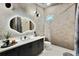 Contemporary bathroom featuring a unique mirror, modern vanity, and stylish decor accents at 112 Rogers Street Ne # 505, Atlanta, GA 30317