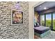Modern bedroom showcases unique wall art and decor, plush bedding, and balcony access at 112 Rogers Street Ne # 505, Atlanta, GA 30317