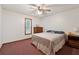 Bedroom with ceiling fan, single window and vintage furnishings at 251 Sabrina Ct, Woodstock, GA 30188