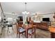 Open concept dining area with durable flooring, and modern lighting at 251 Sabrina Ct, Woodstock, GA 30188