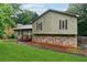 Charming home featuring a stone foundation and inviting front porch entrance at 251 Sabrina Ct, Woodstock, GA 30188