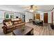 Inviting living room with durable flooring, and access to the dining area at 251 Sabrina Ct, Woodstock, GA 30188