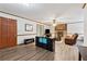 Spacious living room with brick fireplace and durable flooring at 251 Sabrina Ct, Woodstock, GA 30188