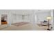 Spacious finished basement with built-in shelving, an area rug and recessed lighting at 400 Old Ivy Ne Rd, Atlanta, GA 30342