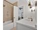 Bright bathroom with modern fixtures, walk-in shower, and view into bedroom at 400 Old Ivy Ne Rd, Atlanta, GA 30342