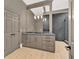 Modern bathroom with double sink vanity, sleek countertops, and minimalist lighting at 400 Old Ivy Ne Rd, Atlanta, GA 30342