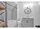 Well-lit bathroom with a shower and modern fixtures at 400 Old Ivy Ne Rd, Atlanta, GA 30342
