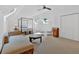 Bright bedroom with dormer windows, seating area, and double door closet at 400 Old Ivy Ne Rd, Atlanta, GA 30342