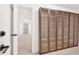 Hallway featuring glass front cabinets with a view to the rest of the home at 400 Old Ivy Ne Rd, Atlanta, GA 30342
