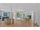 Bright, open kitchen boasts wood floors, a kitchen island, and plenty of natural light at 400 Old Ivy Ne Rd, Atlanta, GA 30342