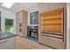Bright kitchen featuring stainless steel appliances, a fireplace, and plenty of cabinets at 400 Old Ivy Ne Rd, Atlanta, GA 30342