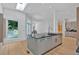 Bright kitchen features a large island, wood floors, and ample storage at 400 Old Ivy Ne Rd, Atlanta, GA 30342