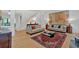 Open living room features a staircase, hardwood floors and artistic decor at 400 Old Ivy Ne Rd, Atlanta, GA 30342