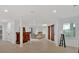 Spacious living room showcasing tile floors, natural light, and an open floor plan at 400 Old Ivy Ne Rd, Atlanta, GA 30342
