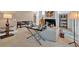 Spacious living room with neutral paint, fireplace, tile flooring, and ample seating at 400 Old Ivy Ne Rd, Atlanta, GA 30342