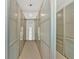 Large walk-in closet with ample storage, custom shelving, and soft carpeting at 400 Old Ivy Ne Rd, Atlanta, GA 30342