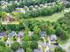 Aerial view of the home, showcasing its location within a lush, green, desirable neighborhood at 5844 Brookstone Nw Walk, Acworth, GA 30101