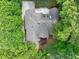 Stunning aerial perspective of a gray roof and verdant trees surrounding a property with a deck at 5844 Brookstone Nw Walk, Acworth, GA 30101