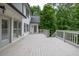 Large, freshly painted back deck offers stunning views of the wooded backyard at 5844 Brookstone Nw Walk, Acworth, GA 30101