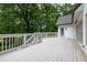 Spacious back deck provides ample room for outdoor seating and relaxation with wooded view at 5844 Brookstone Nw Walk, Acworth, GA 30101