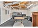 Basement with open ceiling, rubber flooring, and kitchenette with checkered backsplash and cabinets at 5844 Brookstone Nw Walk, Acworth, GA 30101
