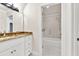 Bathroom with shower-tub combo and granite countertops at 5844 Brookstone Nw Walk, Acworth, GA 30101