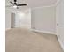 Spacious bedroom featuring neutral carpet, crown molding, recessed lighting, and a ceiling fan for added comfort at 5844 Brookstone Nw Walk, Acworth, GA 30101