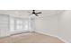 Spacious bedroom featuring bright light and ceiling fan at 5844 Brookstone Nw Walk, Acworth, GA 30101