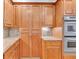 Detailed shot of kitchen cabinetry with granite countertops and stainless steel appliances at 5844 Brookstone Nw Walk, Acworth, GA 30101