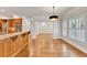Open kitchen and living area with island and stainless steel appliances at 5844 Brookstone Nw Walk, Acworth, GA 30101