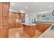 Spacious kitchen featuring wood cabinets, granite countertops, and stainless steel appliances at 5844 Brookstone Nw Walk, Acworth, GA 30101