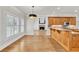 Open kitchen showcasing a breakfast bar, wood cabinets and stainless steel appliances at 5844 Brookstone Nw Walk, Acworth, GA 30101